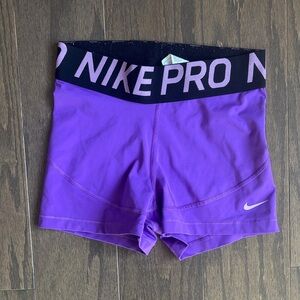 Nike Pro purple spandex shorts